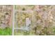 An aerial view of a home featuring a long driveway, and a well manicured, landscaped yard at 4018 Moon Lindley Rd, Snow Camp, NC 27349