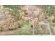 Aerial view of the Geodesic dome home amongst mature trees at 4018 Moon Lindley Rd, Snow Camp, NC 27349