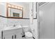 Bathroom featuring a white vanity and tiling, along with a glass enclosed shower at 4018 Moon Lindley Rd, Snow Camp, NC 27349