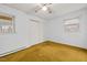 This bedroom features two windows, and a double door closet at 4018 Moon Lindley Rd, Snow Camp, NC 27349