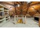 Lofted space on interior of dome home with distinctive wooden framework and a ladder at 4018 Moon Lindley Rd, Snow Camp, NC 27349
