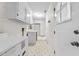 Functional laundry room with washer, dryer, and ample storage space at 4018 Moon Lindley Rd, Snow Camp, NC 27349