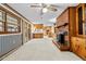 Expansive living space with a brick fireplace, built-in cabinets and access to outside at 4018 Moon Lindley Rd, Snow Camp, NC 27349