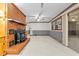 Spacious living room boasts a brick fireplace and large windows offering ample natural light at 4018 Moon Lindley Rd, Snow Camp, NC 27349