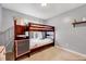 Bedroom with bunk beds, natural light, and neutral paint at 413 Correy Pl, Clayton, NC 27520