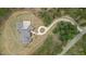 Birds eye view of a luxury home with manicured lawn and a winding driveway at 482 Emily Ln, Chapel Hill, NC 27516