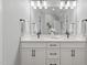 Modern bathroom with double vanity, sleek fixtures, and a calming atmosphere at 482 Emily Ln, Chapel Hill, NC 27516