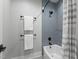 Stylish bathroom features a soaking tub with gray subway tile and black fixtures at 482 Emily Ln, Chapel Hill, NC 27516