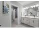 Modern bathroom with double vanity, sleek fixtures, and a separate shower area at 482 Emily Ln, Chapel Hill, NC 27516