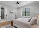 Bedroom featuring hardwood floors and a view to the ensuite bathroom at 482 Emily Ln, Chapel Hill, NC 27516