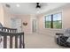 Charming bedroom with neutral tones and a cozy sitting area near the window at 482 Emily Ln, Chapel Hill, NC 27516