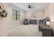 Cozy Bedroom featuring a crib, chair, dresser, and a serene atmosphere at 482 Emily Ln, Chapel Hill, NC 27516