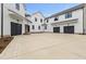 Exterior view of the home with multiple garage doors, offering ample parking space at 482 Emily Ln, Chapel Hill, NC 27516