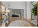 Bright living area with hardwood floors, high ceilings, and seamless open floor plan at 482 Emily Ln, Chapel Hill, NC 27516