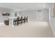 Expansive recreation room with a bar, comfortable seating, and neutral tones at 482 Emily Ln, Chapel Hill, NC 27516