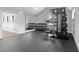 Home gym featuring weightlifting equipment and a large mirror for training at 482 Emily Ln, Chapel Hill, NC 27516