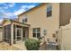 View of the rear exterior showcasing the screened porch and fenced-in yard at 520 Brier Crossings Loop, Durham, NC 27703