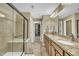 Elegant bathroom featuring a walk-in shower with a built-in bench at 520 Brier Crossings Loop, Durham, NC 27703
