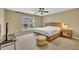 Cozy bedroom with plush carpet, natural light from the window, and neutral walls and trim at 520 Brier Crossings Loop, Durham, NC 27703