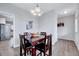 Inviting dining area with hardwood floors and decorative artwork at 62 Narmada Ct, Zebulon, NC 27597