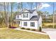 A lovely two-story home with a well-maintained lawn and landscaping at 62 Narmada Ct, Zebulon, NC 27597