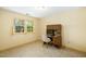 Bedroom with a computer desk and natural light flowing through the window at 704 Emory Dr, Chapel Hill, NC 27517