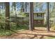 Charming two-story home with a brick facade and a serene wooded setting at 704 Emory Dr, Chapel Hill, NC 27517