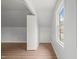 Bright bonus room with wood-look flooring and lots of light at 8000 Old Deer Trl, Raleigh, NC 27615