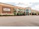 A Lifetime Athletic building with a brick facade and ample parking at 8000 Old Deer Trl, Raleigh, NC 27615
