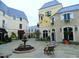 European style courtyard with fountain and shops for quaint village feel at 8000 Old Deer Trl, Raleigh, NC 27615