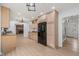 Spacious kitchen with stainless steel appliances and views of the fireplace at 8000 Old Deer Trl, Raleigh, NC 27615
