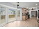 Bright kitchen features modern appliances, ample cabinet space, and a bay window overlooking the deck at 8000 Old Deer Trl, Raleigh, NC 27615