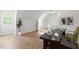 Bright, vaulted office space with wood floors, neutral walls and work space at 8000 Old Deer Trl, Raleigh, NC 27615