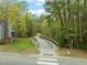 View of the community's pathway, perfect for a leisurely walk and enjoying the scenery at 8000 Old Deer Trl, Raleigh, NC 27615