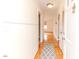 Bright entryway with hardwood floors, leading to the living spaces at 808 N Franklin Dr, Sanford, NC 27330