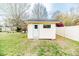 Outdoor storage shed in backyard with siding, a door, and a window at 808 N Franklin Dr, Sanford, NC 27330