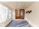 Bright sunroom featuring a ceiling fan and door with glass leading into an interior room at 808 N Franklin Dr, Sanford, NC 27330