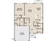 A spacious first floor floor plan with the primary suite, kitchen, and garage entrances at 825 Kenyon Spring Dr, Zebulon, NC 27597