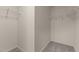 Walk-in closet with wire shelving and neutral carpeting at 829 Kenyon Spring Dr, Zebulon, NC 27597