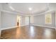 Primary bedroom boasts a trey ceiling and ensuite bathroom at 8418 Wheatstone Ln, Raleigh, NC 27613