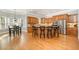 Spacious kitchen featuring custom cabinets, stainless steel appliances and granite countertops with bar seating at 8418 Wheatstone Ln, Raleigh, NC 27613
