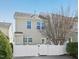 Backyard featuring a white fence and shrubbery at 912 Ambergate Sta, Apex, NC 27502