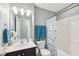 Bathroom featuring a vanity, toilet, tub, shower, and flower curtain at 912 Ambergate Sta, Apex, NC 27502