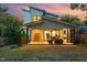 Gorgeous backyard featuring a covered patio and an outdoor fireplace at 915 S State St, Raleigh, NC 27601