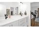 Bright bathroom features dual sinks, quartz countertops, modern fixtures, and ample storage space at 915 S State St, Raleigh, NC 27601