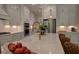 Gourmet kitchen featuring a quartz countertop, modern appliances, and eat-in island seating for casual dining at 97 August Trace Dr, Pittsboro, NC 27312
