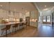 Spacious kitchen featuring stainless steel appliances, large island, and ample cabinet space for culinary enthusiasts at 97 August Trace Dr, Pittsboro, NC 27312