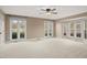 Spacious bedroom with multiple windows offering lovely views of the outdoors at 97 Bailey Rd, Coats, NC 27521