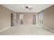 Primary bedroom with lots of natural light and ensuite bathroom entrances at 97 Bailey Rd, Coats, NC 27521