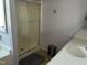 Bathroom featuring a tub/shower combination and vanity with ample counter space at 10 Sapphire Dr, Sanford, NC 27332